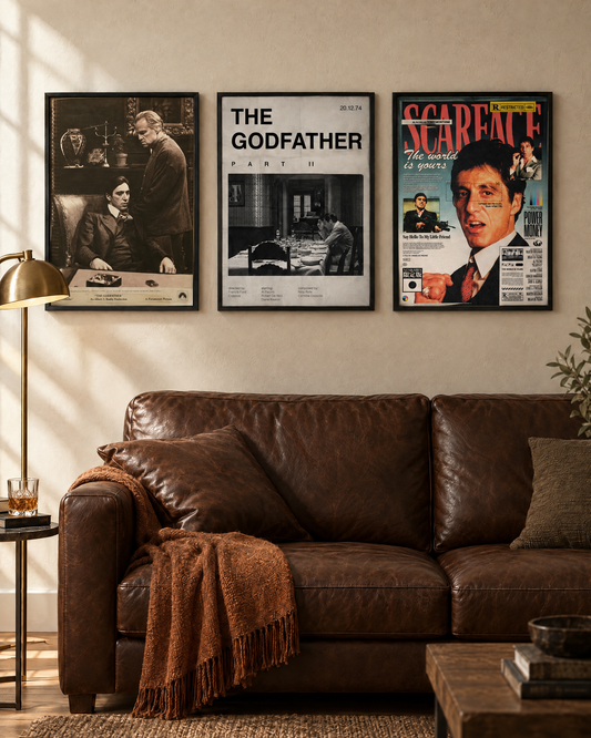 The Family Business set of 3 framed posters on a living room wall