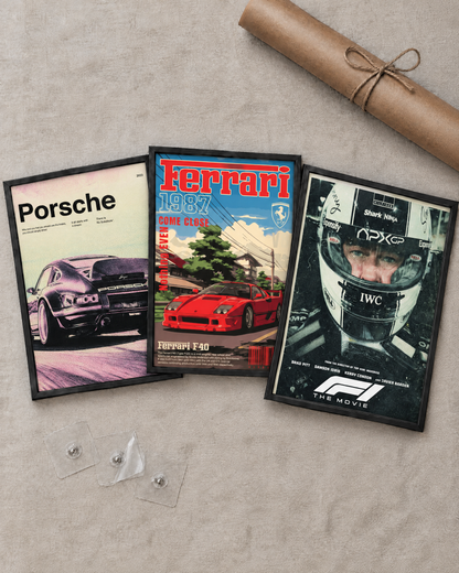 Flat lay of the 3 framed posters with free adhesive wall nails