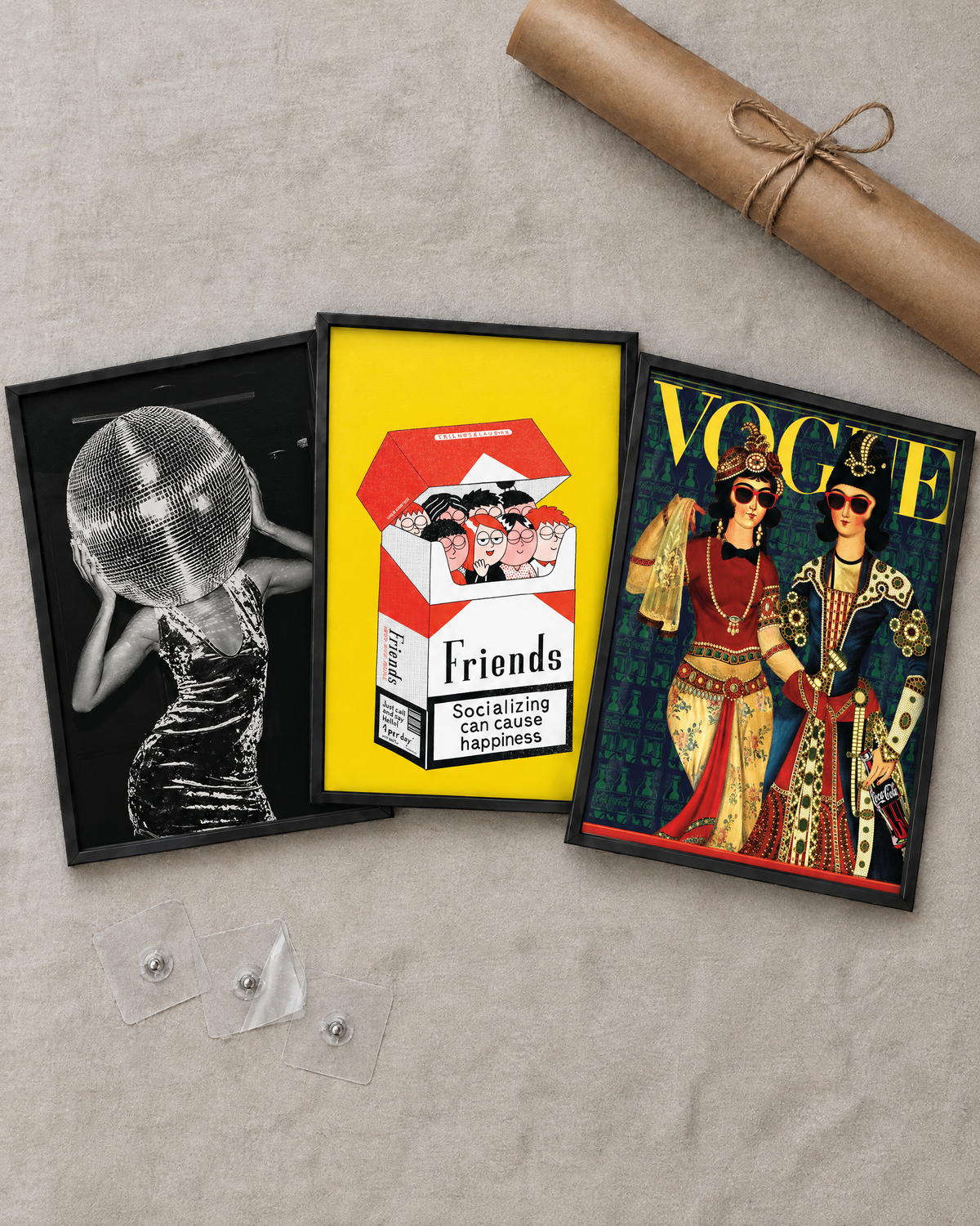 Flat lay of the 3 framed posters with free adhesive wall nails