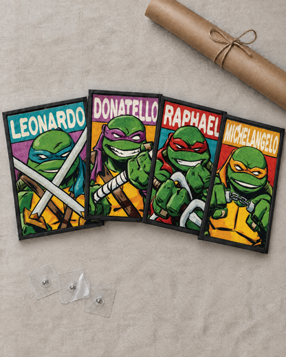 Flat lay of the 4 framed posters with free adhesive wall nails